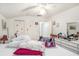 Bright bedroom with white walls, ample natural light, and closet, offering a clean and simple living space at 3115 W Wyoming Ave, Tampa, FL 33611