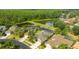 Beautiful aerial view of home with a pond in the backyard providing a natural and serene environment at 3254 Grassglen Pl, Wesley Chapel, FL 33544