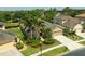 Charming home boasting lush landscaping, mature trees, and a well-manicured lawn, creating great curb appeal at 3254 Grassglen Pl, Wesley Chapel, FL 33544