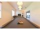 Bright game room with a well-lit pool table and neutral interior design at 3254 Grassglen Pl, Wesley Chapel, FL 33544