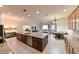 Expansive open concept kitchen with granite island and modern appliances at 3254 Grassglen Pl, Wesley Chapel, FL 33544