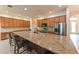 Spacious kitchen featuring a large center island and stainless steel appliances at 3254 Grassglen Pl, Wesley Chapel, FL 33544