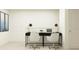 Shared office nook featuring two desks, chairs, and contemporary design for a productive workspace at 36264 Risa Michele St, Zephyrhills, FL 33541