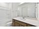 Bathroom with vanity, large mirror, and shower and tub combo at 37194 Clinch Cir, Zephyrhills, FL 33540