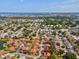 A neighborhood community has scenic views of nearby lakes and the Gulf of Mexico in the background at 4016 Lighthouse Way, New Port Richey, FL 34652