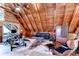Spacious living room with wood ceilings, beams, modern furniture, and zebra rug at 4126 Burrows Rd, Zephyrhills, FL 33542