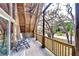 Relaxing porch view with wooden beams and peaceful scenery, perfect for outdoor relaxation at 4126 Burrows Rd, Zephyrhills, FL 33542