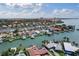 A high-angle aerial view of canal-front homes featuring private boat docks and scenic waterway access at 4333 48Th S Ave, St Petersburg, FL 33711