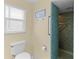 Cozy bathroom with a tiled walk-in shower and comfort height toilet at 4333 48Th S Ave, St Petersburg, FL 33711