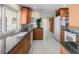 Well-appointed kitchen featuring granite countertops, custom cabinetry, and ample space for food preparation and storage at 4333 48Th S Ave, St Petersburg, FL 33711
