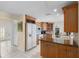 Traditional eat-in kitchen features custom cabinetry and granite countertops at 4333 48Th S Ave, St Petersburg, FL 33711