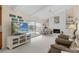 Spacious living room with fireplace and water views at 4333 48Th S Ave, St Petersburg, FL 33711