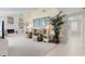 Open living room with fireplace and neutral carpet at 4333 48Th S Ave, St Petersburg, FL 33711