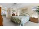 Spacious main bedroom with carpet and ensuite bathroom at 4333 48Th S Ave, St Petersburg, FL 33711