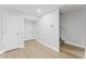 Inviting foyer with hardwood floors, white walls, and staircase leading to the upper level at 4513 Bay Spring Ct, Tampa, FL 33611