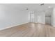 Open living room with natural light, neutral paint, and hardwood floors offering a welcoming space at 4513 Bay Spring Ct, Tampa, FL 33611
