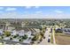 Overhead shot of a community featuring well-kept townhomes and lush landscaping at 4550 Globe Thistle Dr, Tampa, FL 33619