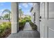 Inviting front entrance with a well-manicured walkway and lush tropical landscaping at 4550 Globe Thistle Dr, Tampa, FL 33619