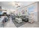 Bright living room featuring tile floors and contemporary furniture at 4550 Globe Thistle Dr, Tampa, FL 33619