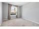 Bedroom with natural light, carpet, and curtains, ideal for relaxation at 5453 Suncatcher Dr, Wesley Chapel, FL 33545