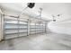 Bright and spacious three car garage with automatic doors and ample lighting at 5453 Suncatcher Dr, Wesley Chapel, FL 33545