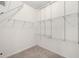 Walk-in closet featuring adjustable wire shelving for optimal storage at 5453 Suncatcher Dr, Wesley Chapel, FL 33545