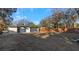 Large backyard featuring a fence and plenty of room to add plants, play, and gather at 6136 56Th N Ave, St Petersburg, FL 33709
