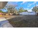Spacious backyard featuring a shed and surrounded by a fence at 6136 56Th N Ave, Kenneth City, FL 33709