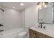 Bathroom with a new vanity, shower with subway tile, and modern fixtures at 6136 56Th N Ave, St Petersburg, FL 33709