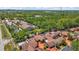 Aerial view shows the home's community, roof, driveway, and landscaping at 713 Dorado Ct, Brandon, FL 33511