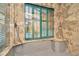 Stone-walled shower with window and view to outside at 713 Dorado Ct, Brandon, FL 33511
