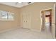 Neutral bedroom with tile flooring, shuttered windows, and closet space at 713 Dorado Ct, Brandon, FL 33511