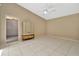 Spacious bedroom with tile flooring, ceiling fan, and large closet at 713 Dorado Ct, Brandon, FL 33511