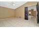 Minimalist bedroom with tile flooring and access to the rest of the home at 713 Dorado Ct, Brandon, FL 33511