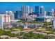 Picturesque aerial view of the condo community, bay, and Tampa skyline at 728 Seagate Dr, Tampa, FL 33602