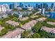 Stunning aerial of the condo community and the downtown city skyline and waterfront in the distance at 728 Seagate Dr, Tampa, FL 33602