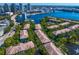 Pictureque aerial view of the condo community near the bay with views of the downtown Tampa skyline at 728 Seagate Dr, Tampa, FL 33602