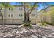 Charming townhouse with attached garages and mature landscaping in a desirable community with tree-lined streets at 728 Seagate Dr, Tampa, FL 33602