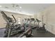 Bright gym with modern treadmills, ellipticals, and stationary bike for a complete workout at 728 Seagate Dr, Tampa, FL 33602