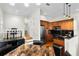 Bright kitchen and dining area featuring modern appliances and hardwood flooring at 728 Seagate Dr, Tampa, FL 33602