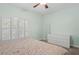 Inviting main bedroom with modern furnishings, neutral colors, and large window at 728 Seagate Dr, Tampa, FL 33602