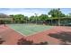 Well-maintained tennis courts showcasing a neatly fenced playing area at 728 Seagate Dr, Tampa, FL 33602