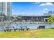 Benches provide a relaxing spot on the waterfront with building and water views at 728 Seagate Dr, Tampa, FL 33602