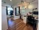 Spacious home office area with hardwood floors, abundant natural light, and creative workspace at 772 71St N Ave, St Petersburg, FL 33702