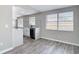 Bright kitchen with white cabinets, quartz countertops, and stainless steel appliances at 9201 Spy Glass Ct, Tampa, FL 33615