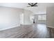 Spacious living room featuring sleek floors, recessed lighting and neutral-toned walls at 9201 Spy Glass Ct, Tampa, FL 33615