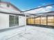 View of the expansive screened-in patio featuring access to sliding glass doors at 9201 Spy Glass Ct, Tampa, FL 33615