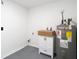 Utility room featuring a new water heater and cabinet at 9201 Spy Glass Ct, Tampa, FL 33615