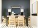 Stylish dining room features a sleek table, comfortable chairs, and elegant decor at 9348 Bonita Mar Dr, Parrish, FL 34219