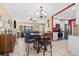 Open concept view of kitchen, dining room and living room. Natural light at 10448 Hetrick W Cir, Largo, FL 33774